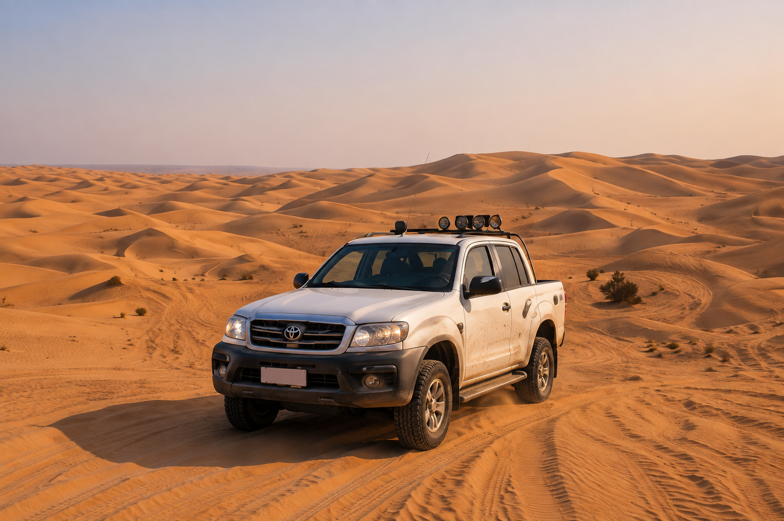 4x4 vehicle on desert safari dunes